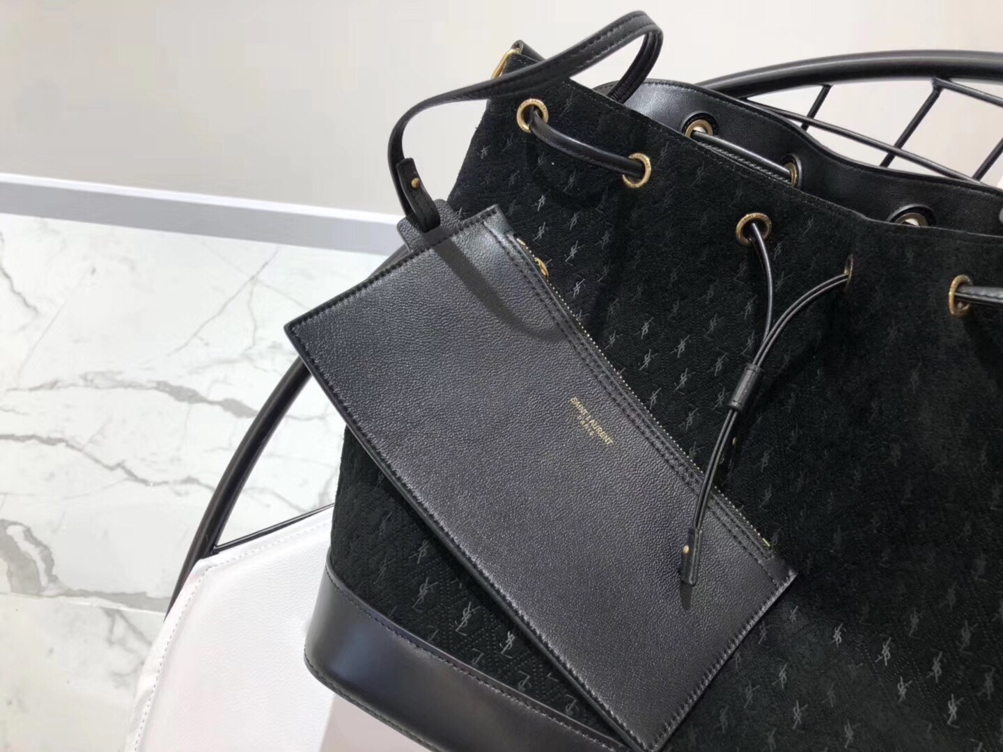 Saint Laurent Monogram All Over Bucket Bag In Black Suede