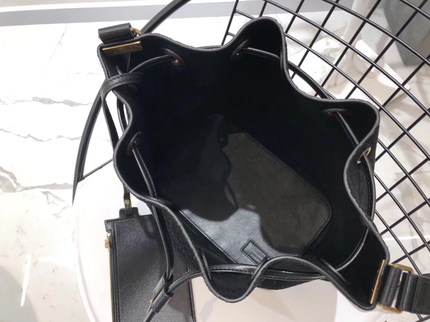 Saint Laurent Monogram All Over Bucket Bag In Black Suede