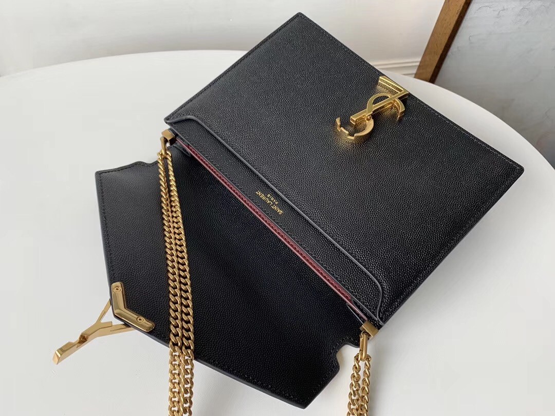 Saint Laurent Cassandra Clasp Bag In Black Grained Leather