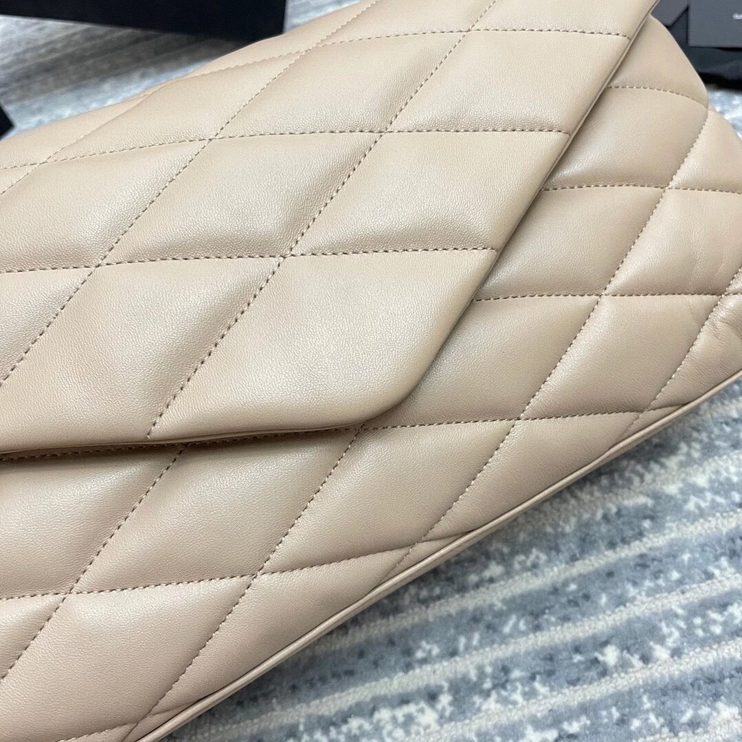 Saint Laurent Sade Puffer Envelope Clutch In Beige Lambskin