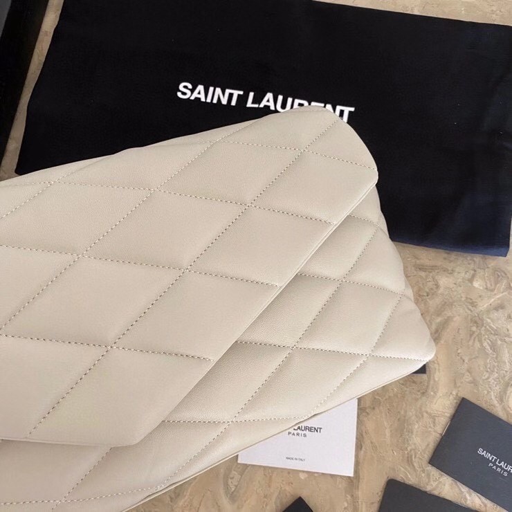 Saint Laurent Sade Puffer Envelope Clutch In White Lambskin