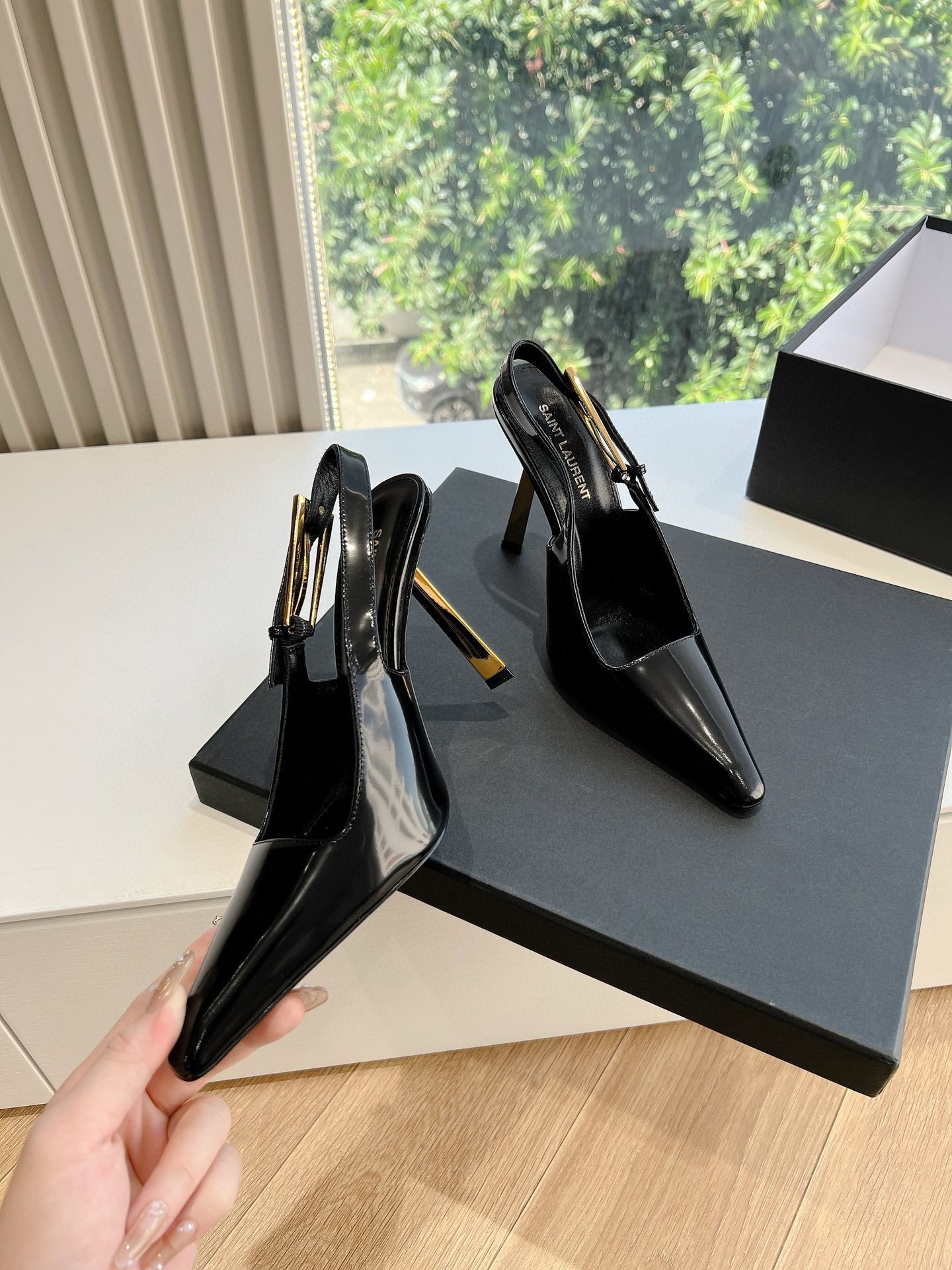 Saint Laurent Lee Slingback Pumps in Black Glazed Leather