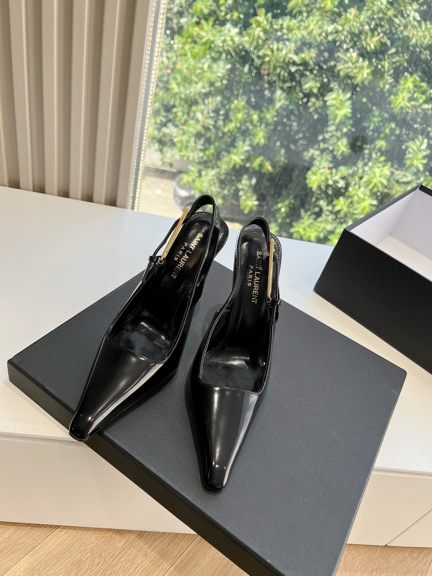 Saint Laurent Lee Slingback Pumps in Black Glazed Leather