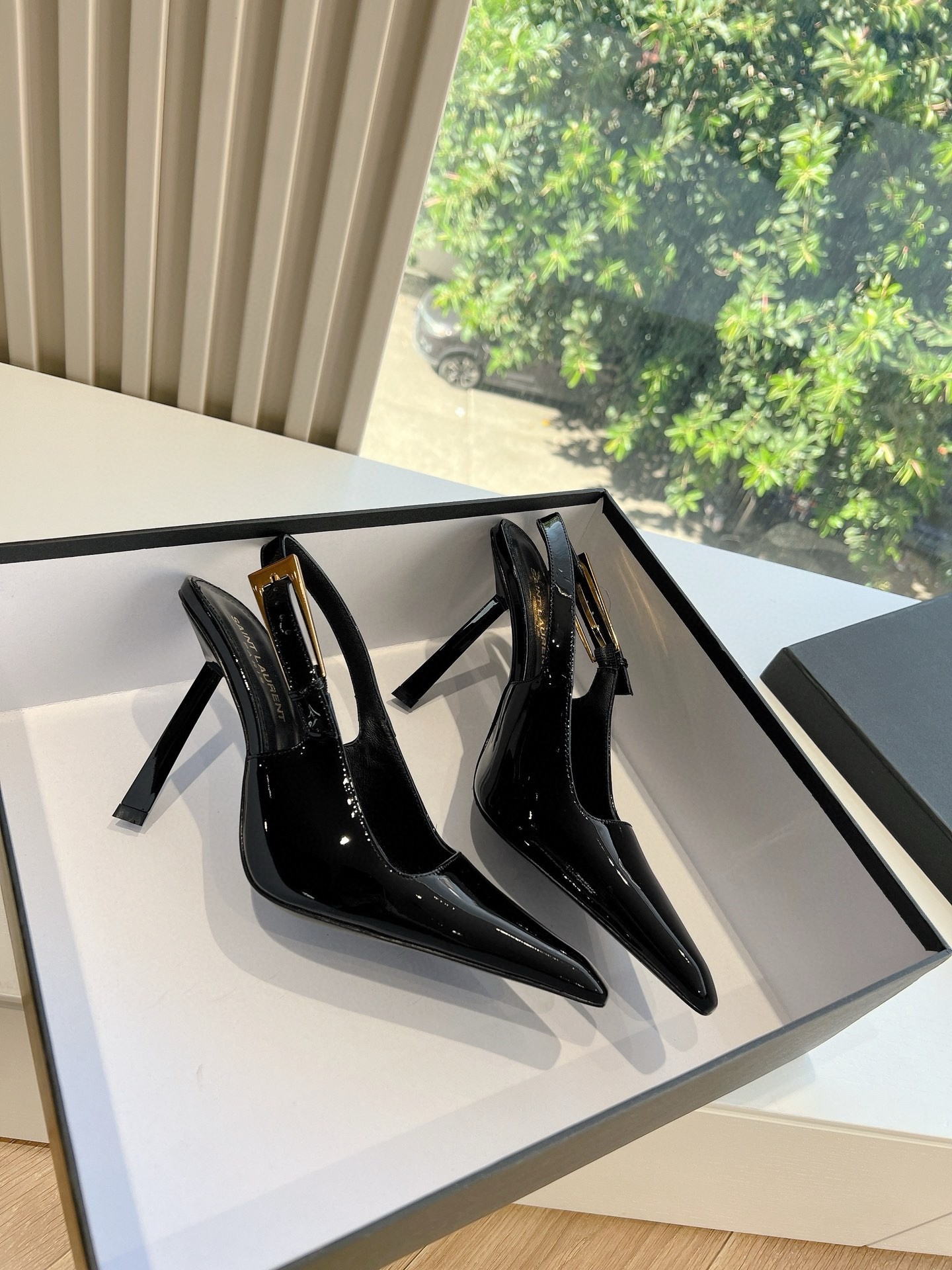 Saint Laurent Lee Slingback Pumps in Black Patent Leather