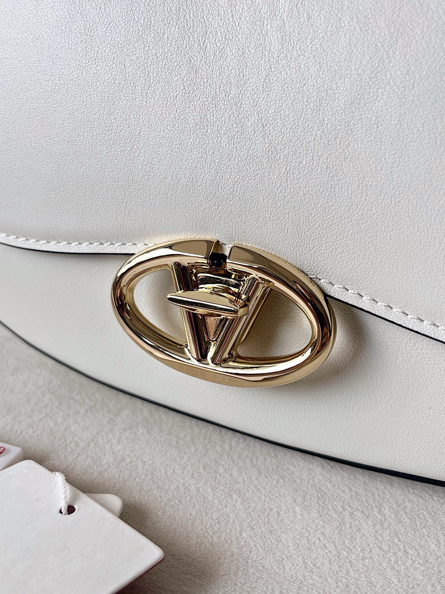 Valentino Garavani Ohval Small Shoulder Bag in White Calfskin