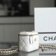 Chanel lambskin cosmetic bag white